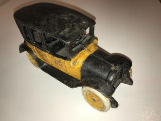 Cast Iron Yellow Cab Toy with rolling wheels 8 