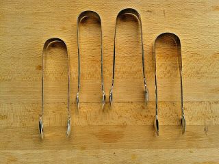4 Pairs Of Antique Exeter Hallmarked Solid Sterling Silver Sugar Tongs/ 180 Gms