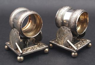 Pair Antique Early 20thc Rogers,  Smith & Co Silverplate Figural Napkin Rings