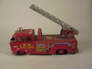 Vintage Made In Japan Tin Fire Truck Friction Toy Ladder Raises
