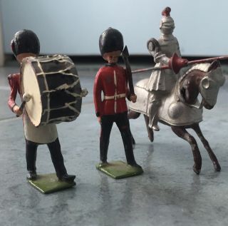 2 Britains Lead Toy Soldiers Plus 1 More Soldier On Horseback Marked Japan