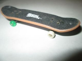 VINTAGE.  TECH DECK.  FLIP TOM PENNY (BLUE,  WHITE,  AND RED SMILEY FACE) 2