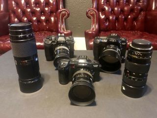 3 Vintage Minolta Maxxum Cameras 7000i,  9000,  700si W/ 2 Lenses & Control Grips