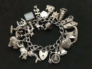 Vintage Sterling Silver Charm Bracelet With 21 Silver Charms.  82 Grams