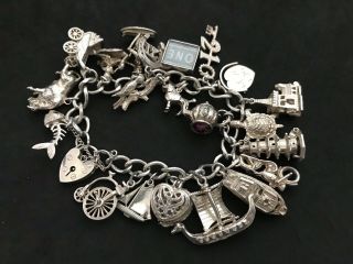 Vintage Sterling Silver Charm Bracelet with 21 Silver Charms.  82 grams 2