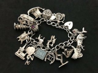 Vintage Sterling Silver Charm Bracelet with 21 Silver Charms.  82 grams 4
