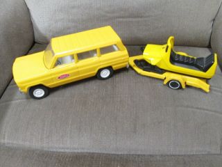 A Vintage 1 Owner Tonka Yellow Jeep Wagoneer With Snowmobile And Trailer.  N/mint