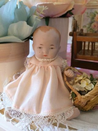 Antique Bisque Miniature Baby Doll With Crib & Rocker Clothes.  Germany