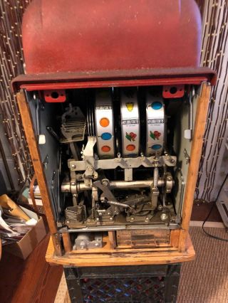 Antique nickel slot machine - well.  Great for parties. 2
