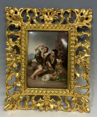 Vintage Porcelain Plaque Of Two Boys And A Dog Having A Picnic