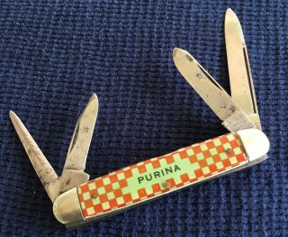 VINTAGE RARE CIRCLE REMINGTON UMC “ PURINA “ ADV.  4 BLADE POCKET KNIFE VG NR 3