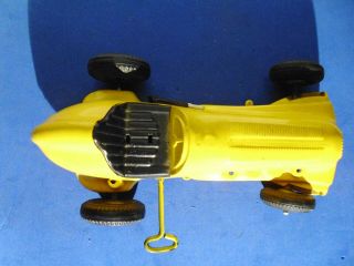 Vintage Yellow Windup Race Car Made in USA 7