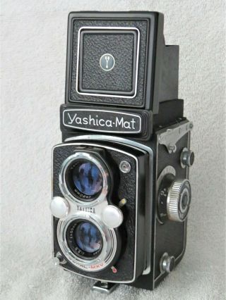 YASHICA - MAT VINTAGE 1957 TLR,  80mm lens,  Copal shutter,  fitted case,  cap, 2