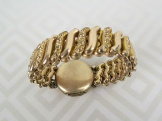 1910 ' s 10k Gold filled whirling logs locket D F Briggs Co.  friendship bracelet 8