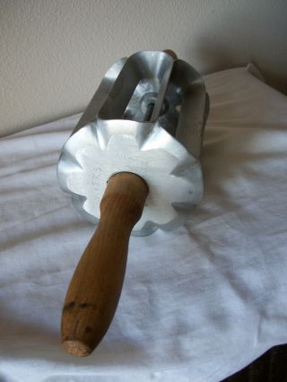 VINTAGE HOUPT CUTTERS - LONG JOHNS,  DONUTS,  BUN CUTTER 1 3/4 X 5 ROLLING PIN 2