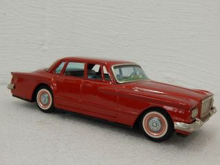 8.  5” Bandai Japan Tin Friction 1960 Plymouth Chrysler Valiant Red