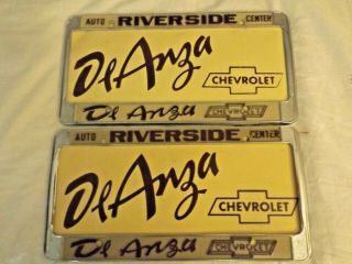 2 Vintage De Anza Riverside California Chevrolet Metal License Plate Frames.