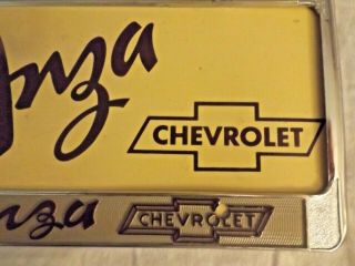 2 Vintage De Anza Riverside California Chevrolet Metal license plate frames. 3
