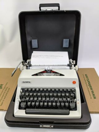 Vintage 1971 Olympia Sm9 Deluxe Typewriter With Case.  Near.