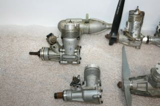 11 Vintage RC Airplane Engines Some W/ Mufflers,  Props & Noise Cones. 2