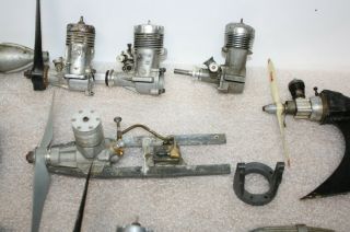 11 Vintage RC Airplane Engines Some W/ Mufflers,  Props & Noise Cones. 3