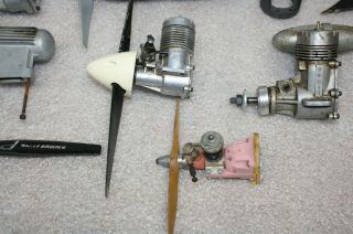 11 Vintage RC Airplane Engines Some W/ Mufflers,  Props & Noise Cones. 6