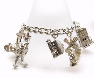 Vintage 1960 ' s Heavy Solid Silver Charm Bracelet 7 Large Feature Charms p&p 4