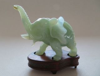 OLD CHINESE JADE TRUNK UP ELEPHANT,  WOOD STAND MID 20TH CENTURY - - - - 2