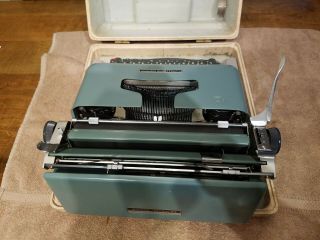 Vintage Blue Olivetti Underwood Studio 44 typewriter with case 6
