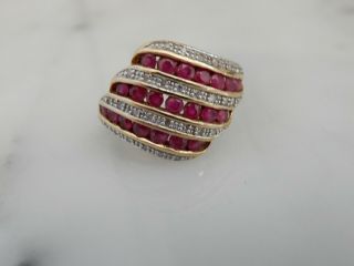 A 9 Ct Gold Large Bombe Shaped Ruby And Diamond Ring