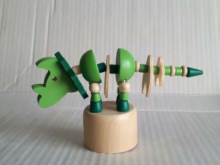 Wooden Dinosaur Bones Skull Two Tone Green Push Button Pushup Puppet Movable Toy