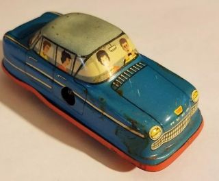 Vintage Technofix Tin Litho Wind Up Car Family Sedan