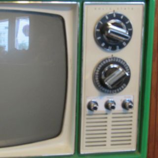Vintage green 1975 Quasar model XP3163MG portable TV 2