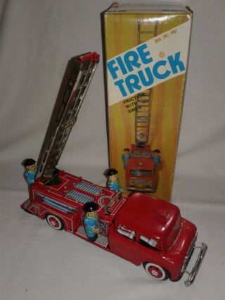 Vintage Tin Litho Fire Truck W/ Automatic Bumper Activated Fire Ladder Sti Toys