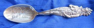 Ml - 0002.  Sterling Silver Souvenir Spoon.  Full Figure Ndian Warrior Aerial Duluth