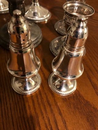 Sterling candle holder,  salt and pepper shaker,  mirror etc 5