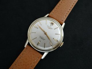 VINTAGE LONGINES CONQUEST GOLD & S.  STEEL DATE AT 12 AUTOMATIC CAL 291 12