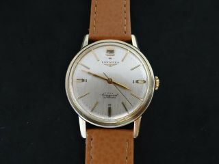 VINTAGE LONGINES CONQUEST GOLD & S.  STEEL DATE AT 12 AUTOMATIC CAL 291 3