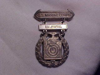 Sterling Silver Wwii Era U.  S.  Marine Corps Pistol Medal With Usmc Emblem On It