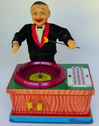Playthings Roulette Man Tin Lithographed Lever Action Toy Japan Made 7.  5 " X 7 "