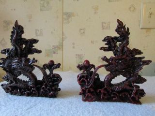 Two Chinese Fire Breathing Dragons Dark Red Resin Figurines