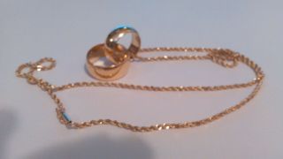 Vintage 14Kt.  Gold Infinity Necklace Handcrafted with Wedding Bands Dated 27.  27g 2