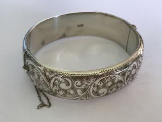 Vintage Silver Finely Engraved Bangle Bracelet.  Width 3/4”.