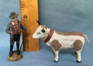 Vintage German Cow Stick Leg Compo 2.  5”l Man 2.  25” Farm Toy Putz Village