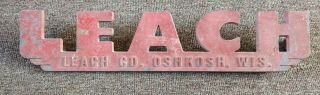 Vintage Leach Mfg.  Co.  Die Cut Metal Truck Emblem Sign.  Oshkosh,  Wisconsin