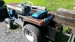 Vintage Ford LGT 100 Lawn and Garden Tractor with 42 