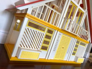 Vintage 1970’s A - Frame Barbie Dream House with accessories and dolls 9