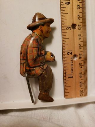 Antique Vintage Collectible Toy Tin Sitting Man,  Puffed Tin Man.  Lithograph
