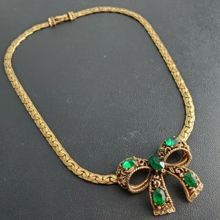 Signed Coro Vintage Brass Gold Tone Bow Emerald Rhinestone Scroll Necklace S133