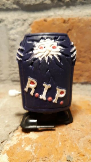 Vtg R.  I.  P.  WHITE KNOB WIND - UP TOY CHINA REST IN PEACE casket Halloween 2 2